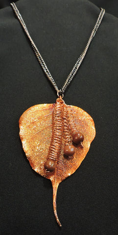 Copper Bodhi Leaf with Wood Beads and Copper Spirals Pendant