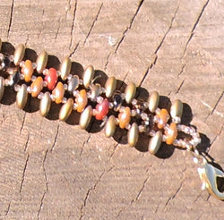 Bracelet with Varied Brown Tones and Gold Beads