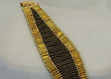 Bracelet of Gold Bugle Beads Surrounding Brown Seed Beads