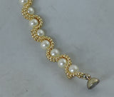 Bracelet with Swarovski Cream Pearls encased with Gold Beads